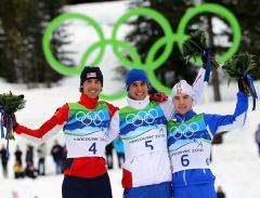 WHISTLER, BC - FEBRUARY 23: Team USA (L-R) Bill Demong, Johnny Spillane, Todd Lodwick, and Brett Camerota celebrate after winning Olympic Silver in the Nordic Combined on day twelve of the 2010 Vancouver Winter Olympics at Whistler Olympic Park Ski Jumping Stadium on February 22, 2010 in Whistler, Canada. (Photo by Clive Mason/Getty Images)